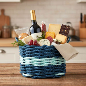 Handwoven rope basket made from durable, weather-resistant material, ideal for everyday storage or décor and gifting