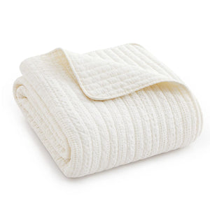 Loden throw blanket with waffle weave design, soft cotton front and back, ideal for cozy home décor.