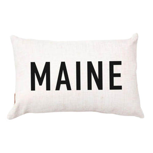 Rectangular decorative throw pillow with a printed word design and a soft fabric cover.