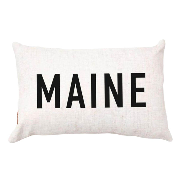 Rectangular decorative throw pillow with a printed word design and a soft fabric cover.