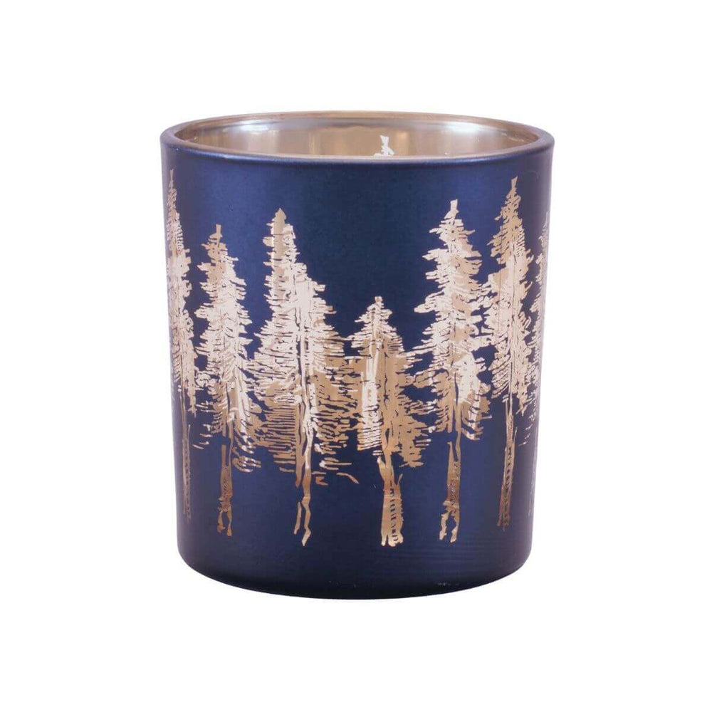 Stylish navy blue candle holder with gold detailing, complementing a bright coastal living