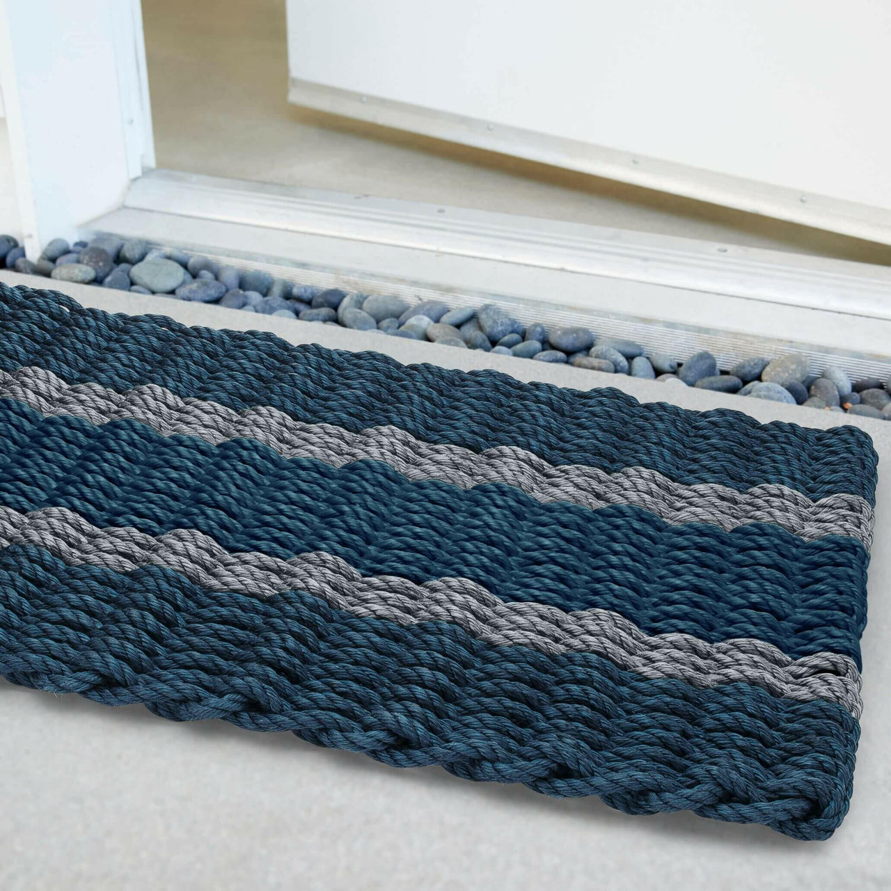 Lobster Rope Doormats, Outdoor Door Mats, Wicked Good Door Mats Made in Maine, Navy with 2 Silver Stripes, Angled View in Front Door