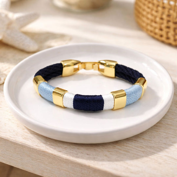 Nautical gold-accented rope bracelet, soft cotton rope, ideal for everyday coastal wear.