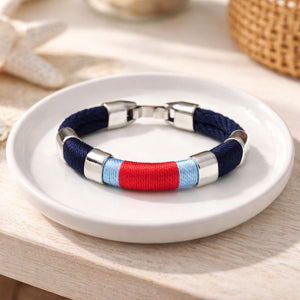 Handcrafted cotton rope bracelet featuring a silver-plated clasp and decorative spacer beads, designed with a relaxed, coastal-inspired vibe.