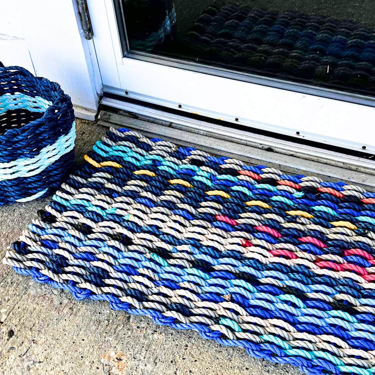 Premium Select Recycled Lobster Rope Doormat, Thin Stripes, 18 x 30, Angled View in Front Door