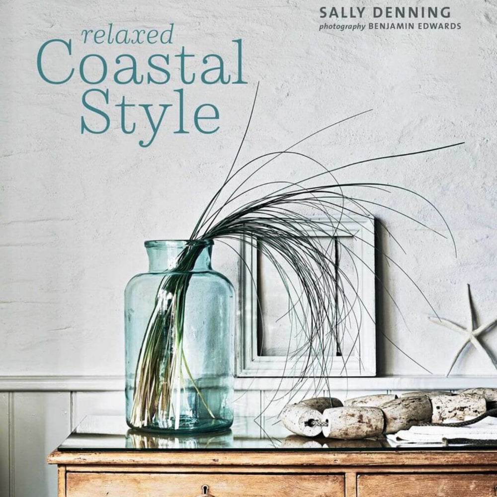 Book cover of 'Relaxed Coastal Style' by Sally Denning with a vase and decorative items on a shelf.