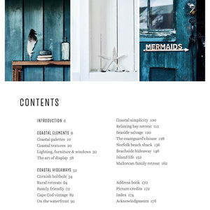 Table of contents for a coastal-themed book or magazine with a blue door and 'Mermaids' sign.