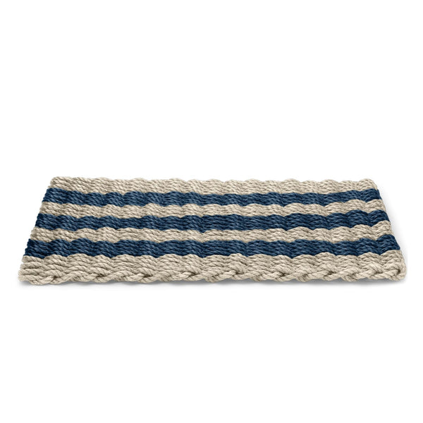 Coastal-inspired sand and navy cabana striped doormat, angled for a stylish home entry display.