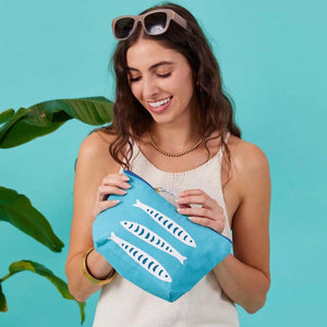 Medium-sized coastal canvas pouch in vibrant print, featuring gold metal zipper and printed looped pull, ideal for travel or everyday use.