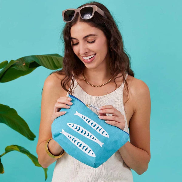 Medium-sized coastal canvas pouch in vibrant print, featuring gold metal zipper and printed looped pull, ideal for travel or everyday use.