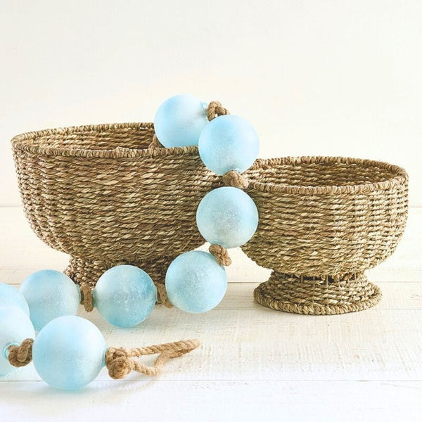 Seagrass storage basket styled with coastal decor