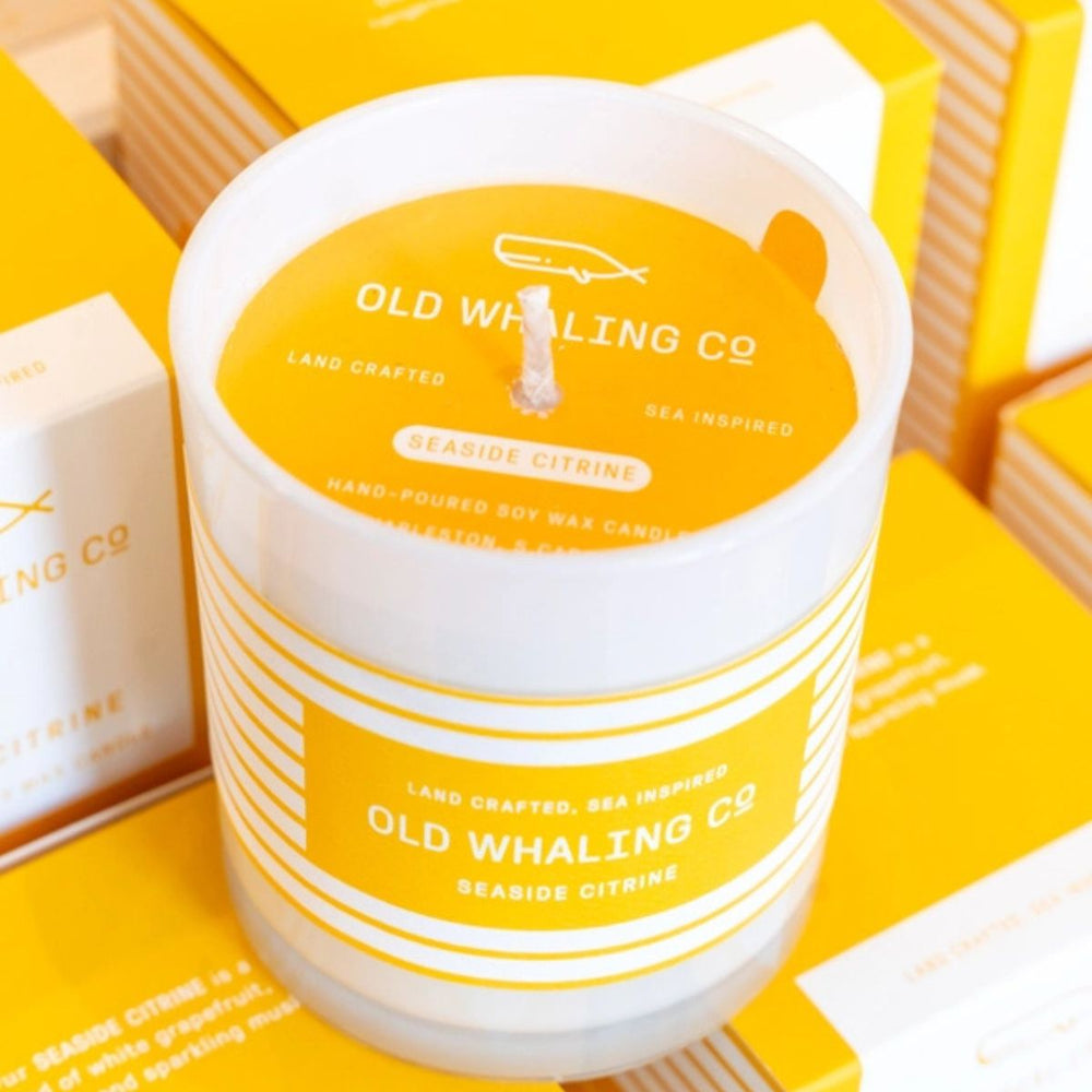 12oz Seaside Citrine® soy and olive wax candle featuring grapefruit and seashore fragrance, perfect for coastal-inspired spaces.