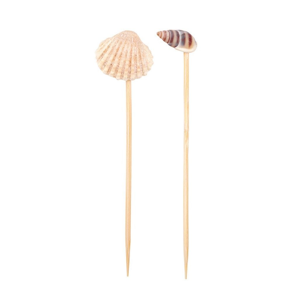 Container filled with shell-topped bamboo cocktail picks for entertaining