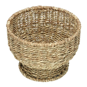 Small round handwoven seagrass basket with natural texture, 9 inches diameter.