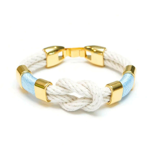 Handcrafted slip-on cotton rope bracelet with gold-plated details, inspired by coastal style.