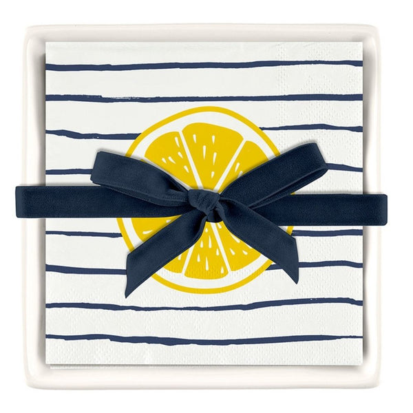 Ceramic cocktail napkin tray with striped lemon napkins tied with ribbon