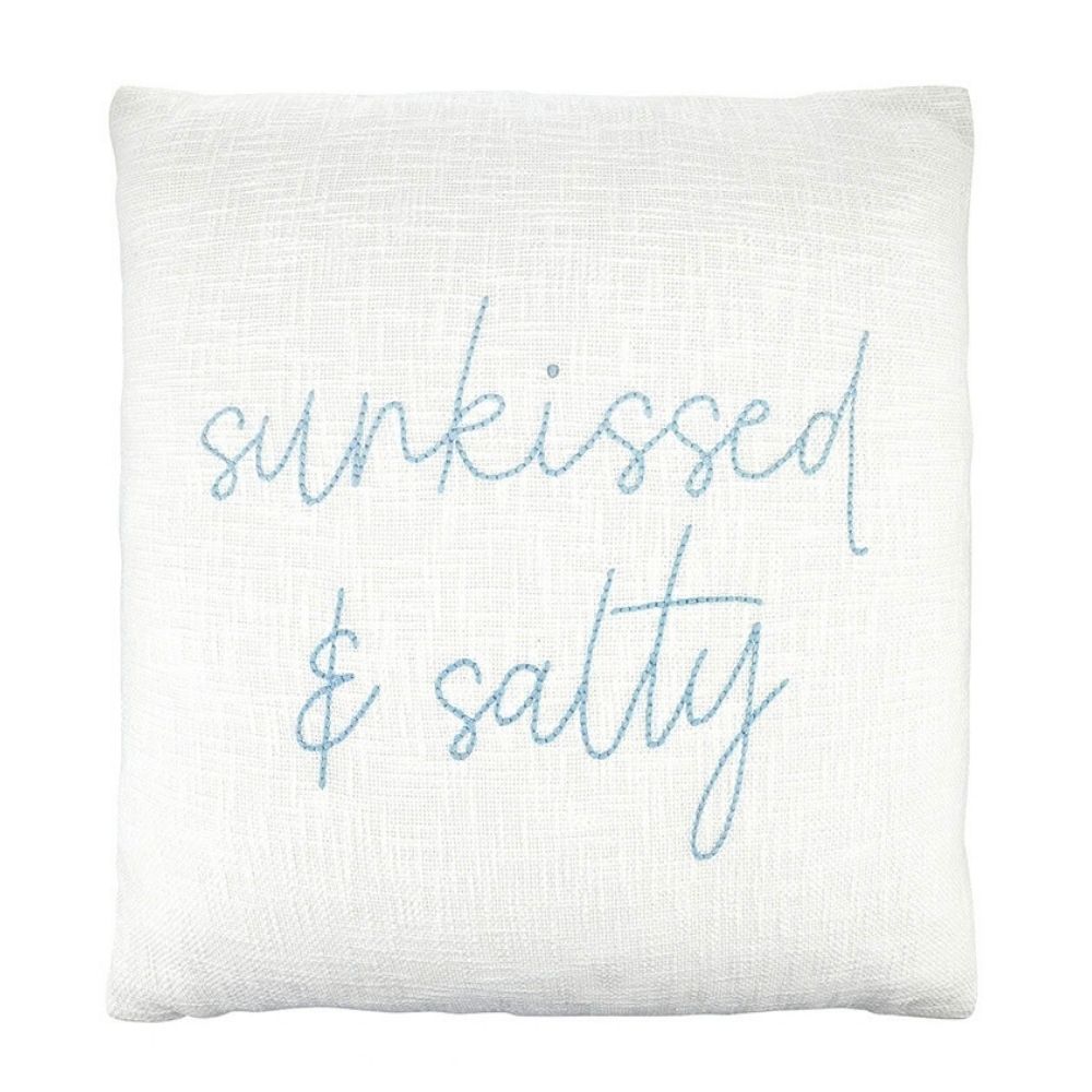 White cotton slub pillow with blue Sunkissed and Salty text