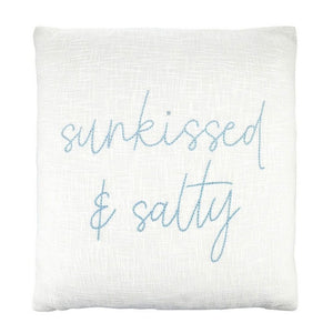 White cotton slub pillow with blue Sunkissed and Salty text