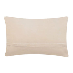 The reverse side of a coastal accent pillow showing smooth, solid cream-colored velvet fabric and a hidden horizontal zipper closure.