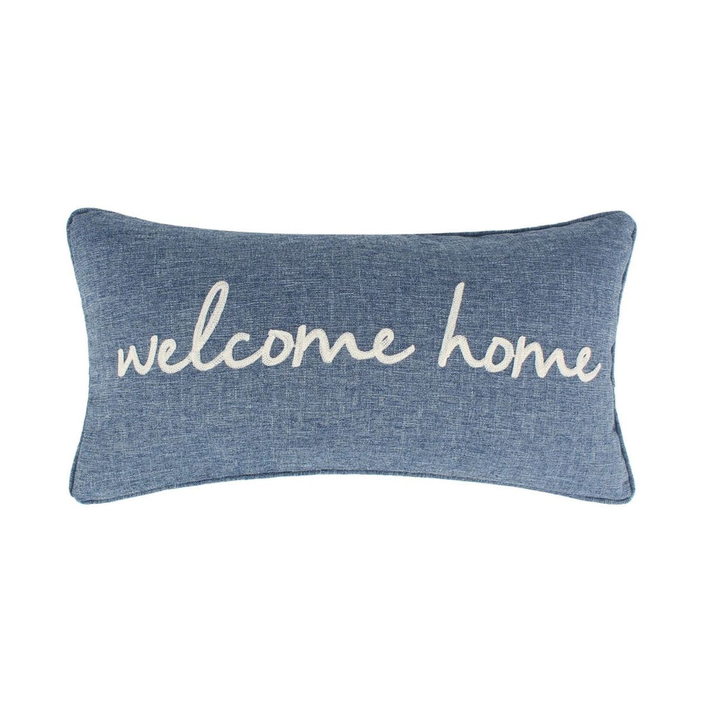 This blue Welcome Home decorative pillow features elegant embroidered text and brings a cozy coastal feel to beds, sofas, or chairs.