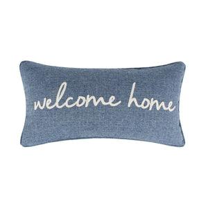 This blue Welcome Home decorative pillow features elegant embroidered text and brings a cozy coastal feel to beds, sofas, or chairs.