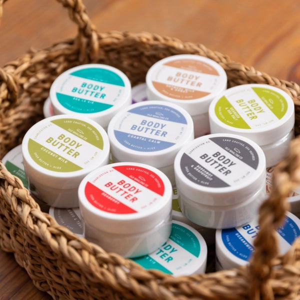 Travel-size 2oz coastal Seaberry body butter with nourishing shea butter and organic oils, featuring a fruity and vanilla aroma for all skin types