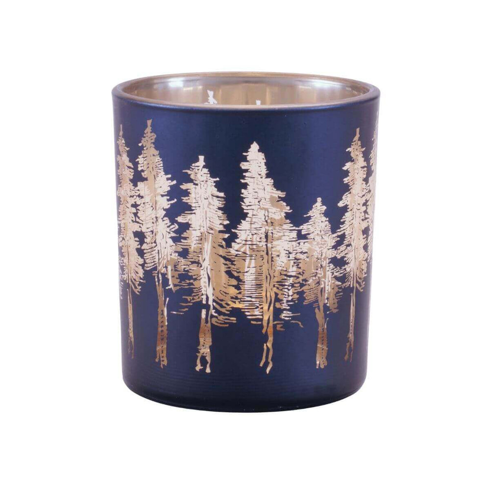 Stylish navy blue candle holder with gold detailing, complementing a bright coastal living
