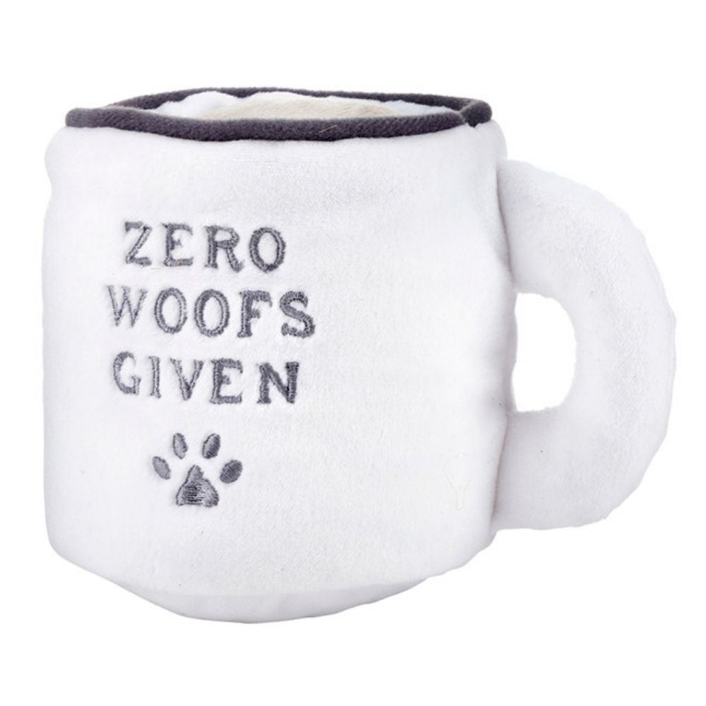 Plush dog toy shaped like a coffee mug with Zero Woofs Given text