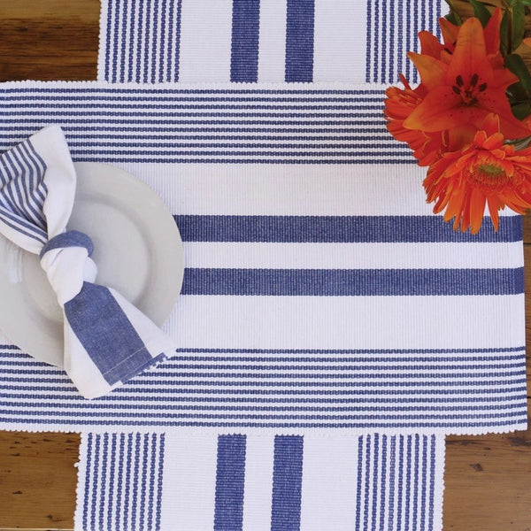 Classic blue and white striped napkin made from soft cotton, 18 x 18 inches, ideal for coastal-inspired dining or elegant everyday tablescapes.