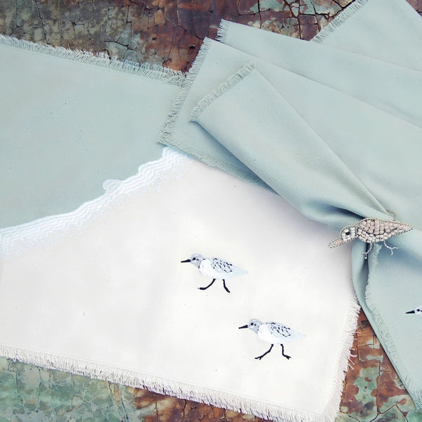 Sandpiper Embroidered Placemat With Natural Cotton, Sea Green Detail And Fringed Edges, Coastal Table Settings And Seaside Dining