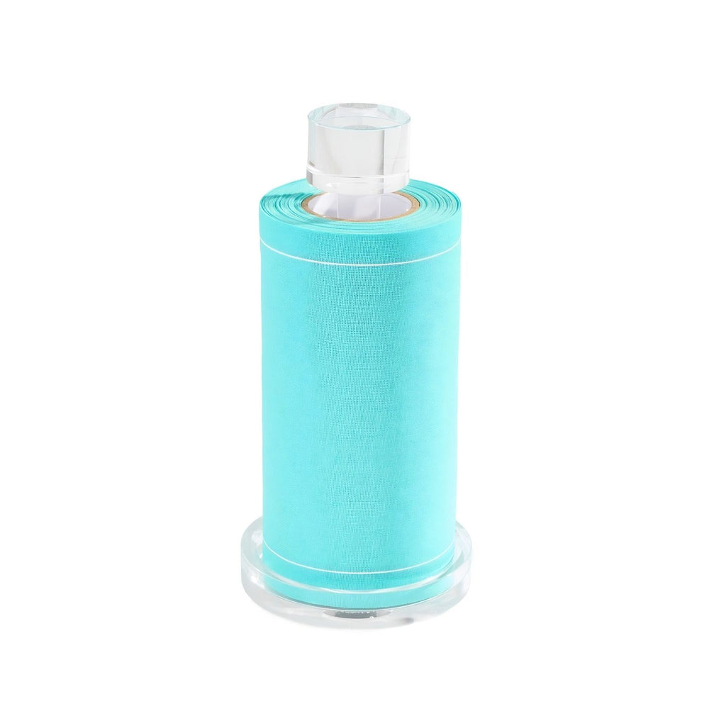 Clear Glass Cocktail Napkin Holder Displayed With A Turquoise Napkin Roll For Entertaining