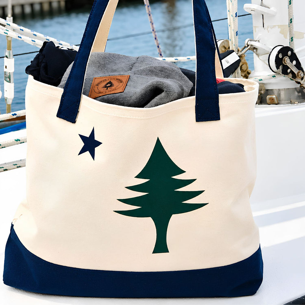 Natural Canvas Maine Flag Tote Bag With Navy Handles And Base, Evergreen Tree And Star Design, Coastal Canvas Tote And New England Gift