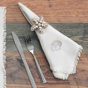 Starfish Napkin Ring Holding A White Cloth Napkin At A Coastal Table Setting, Beach House Dining And Seaside Entertaining