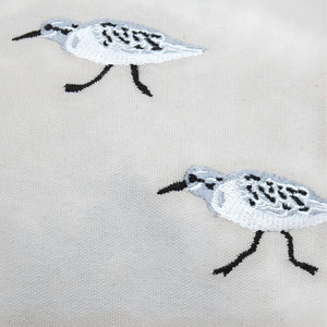 Closeup Of Embroidered Sandpipers On Natural Cotton Placemat, Coastal Table Linens, Beach House Tables And Coastal Dining