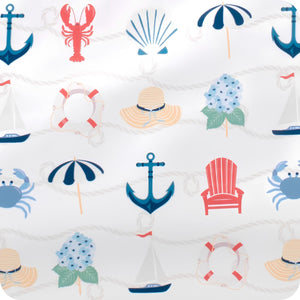 Close-Up Of Shoreline Coastal Print Featuring Anchors Sailboats Hydrangeas Lobsters Beach Umbrellas Lifebuoys And Rope Pattern