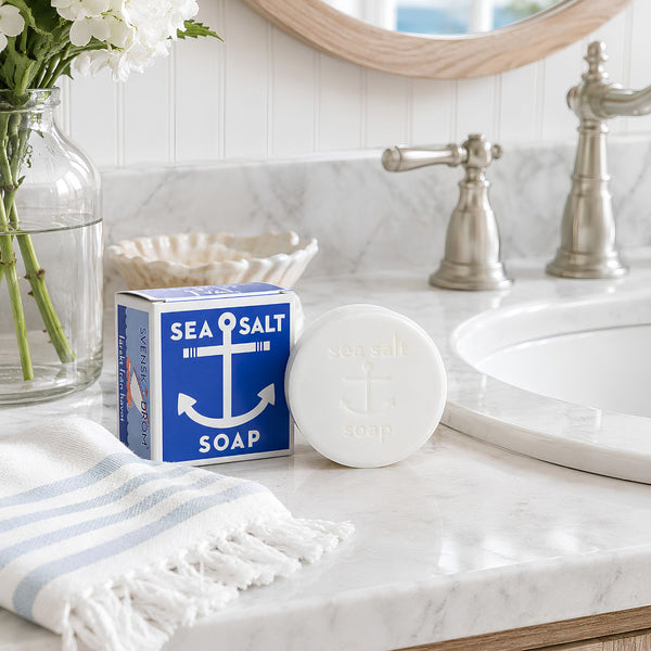Swedish Dream Sea Salt Mineral Soap Bar With Blue Anchor Packaging On A Marble Bathroom Counter, Coastal Bathroom Decor, Sea Salt Bath And Body Gift, USA-Made Soap