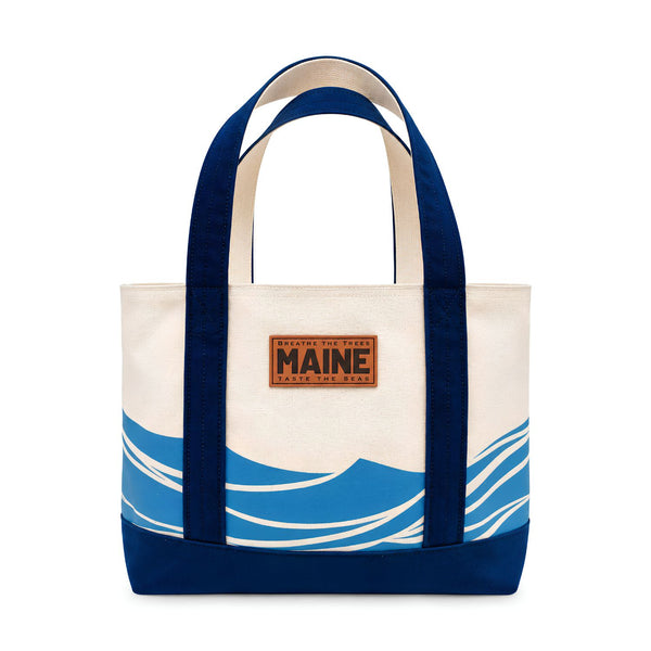 Natural Canvas Taste The Seas Maine Tote Bag With Blue Wave Design, Navy Handles And Base, Coastal Canvas Beach Bag, Maine-Themed Nautical Gift