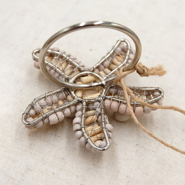 Closeup Of Natural Wood Bead And Twisted Metal Detail On Starfish Napkin Ring, Coastal Table Accessories And Beach House Decor