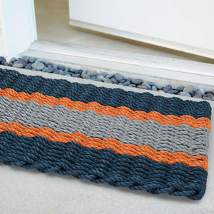 Lobster Rope Doormats, Outdoor Door Mats, Wicked Good Door Mats Made in Maine, Navy, Orange, Silver, Angled View in Front Door