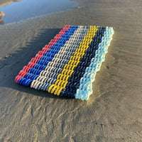 Thumbnail for Lobster Rope Doormats, Outdoor Door Mats, Wicked Good Door Mats Made in Maine, Beachy Vibes, Angled View on the Shore